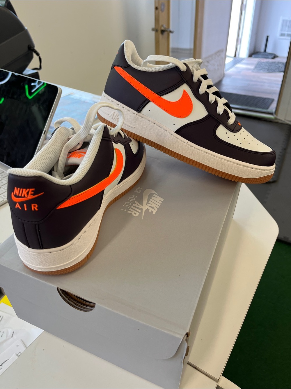 Nike Air Force 1’s Men’s Low-Top Sneakers - Black/White with Orange Swoosh